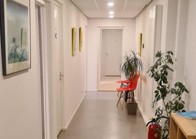 Pranasana • The waiting area with the red chairs